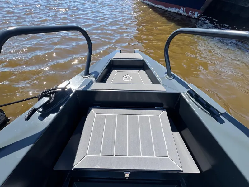 Slide: The Image of 2024 G-Force G-Force 8 boat interior, showing sleek design and sturdy handrails. - 42