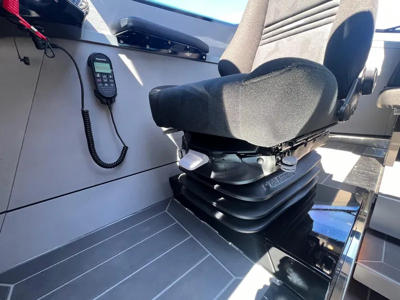 Slide: The Image of 2024 G-Force 8 cockpit with suspension seat and mounted communication device. - 46