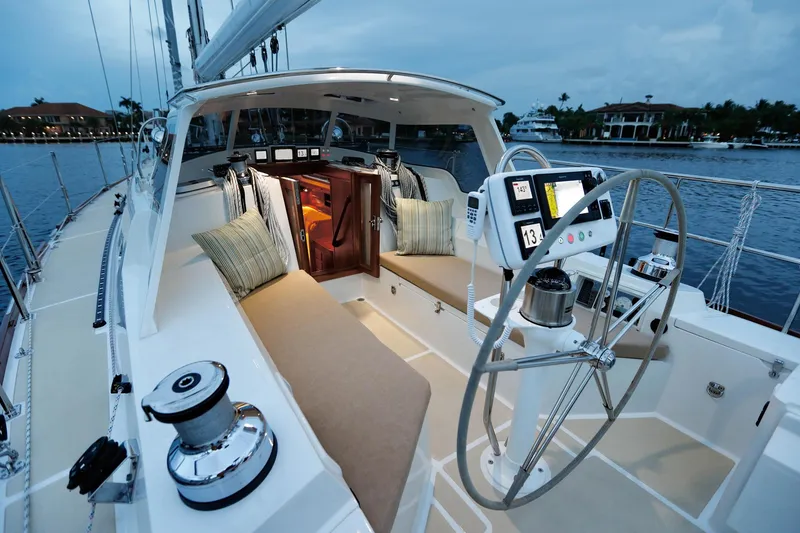 Slide: The Image of Luxury Outbound 46 sailboat cockpit, 2025 model, featuring modern navigation and comfortable seating. - 11