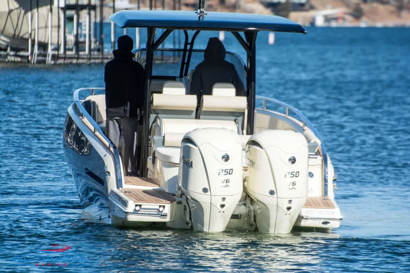 Slide: The Image of 2024 Invictus TT280S boat with twin Yamaha 250 engines on the water. - 20