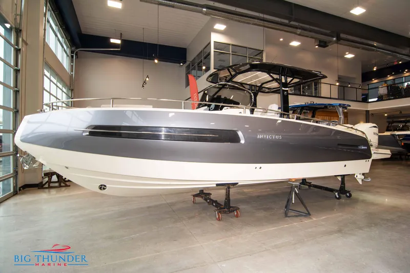 Slide: The Image of 2024 Invictus TT280S luxury boat on display at Big Thunder Marine showroom. - 23