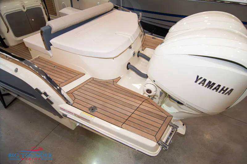 Slide: The Image of 2024 Invictus TT280S boat with Yamaha outboard engines and teak deck. - 30