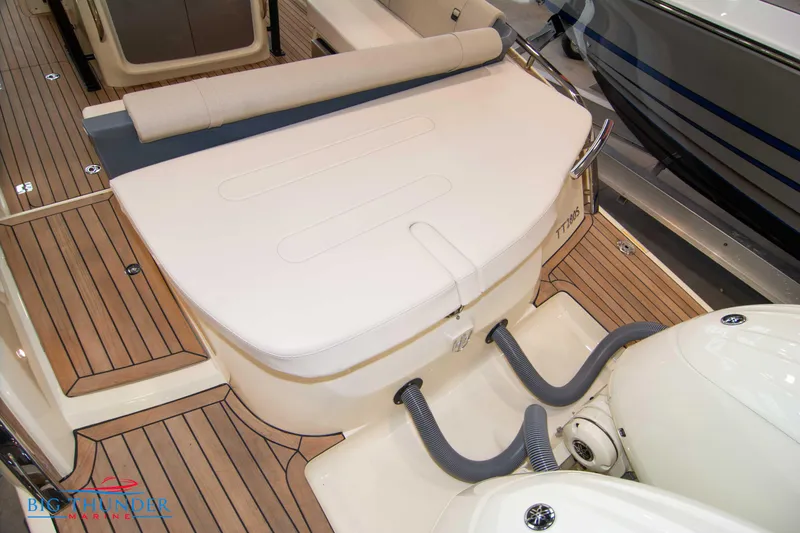Slide: The Image of 2024 Invictus TT280S boat deck with seating and twin outboard motors. - 31