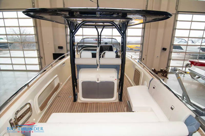 Slide: The Image of 2024 Invictus TT280S boat interior with seating and helm station. - 33