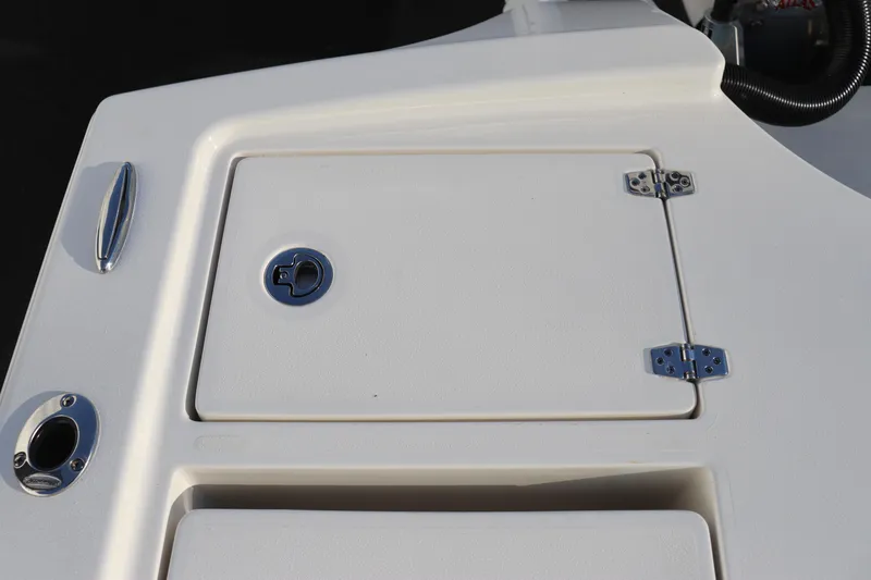 Slide: The Image of 2024 Pathfinder 2500 Hybrid boat storage compartment with stainless steel hardware. - 23
