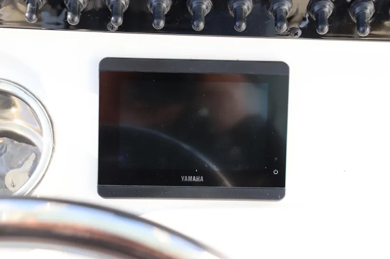 Slide: The Image of Yamaha display screen on 2024 Pathfinder 2500 Hybrid boat dashboard. - 34