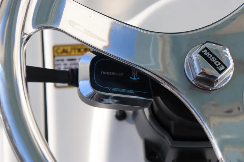 Slide: The Image of Close-up of 2024 Pathfinder 2500 Hybrid steering wheel with FingerFlex control. - 37