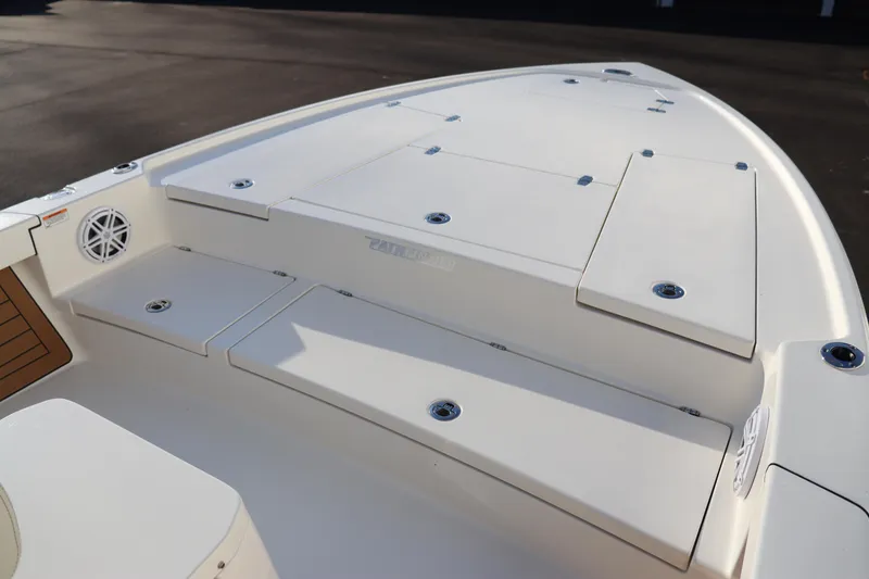 Slide: The Image of 2024 Pathfinder 2500 Hybrid boat deck with storage compartments. - 38