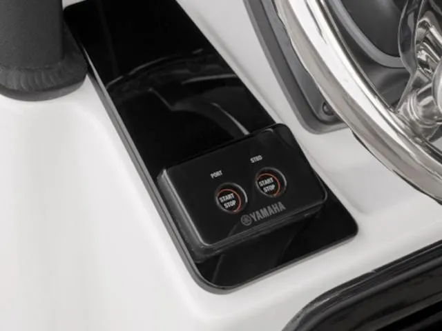 Slide: The Image of Yamaha Boats 2024 255 FSH Sport E start-stop buttons and steering wheel. - 14