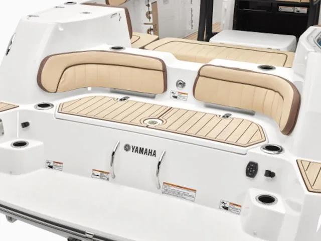 Slide: The Image of 2024 Yamaha Boats 255 FSH Sport H, featuring a sleek, modern deck design with comfortable seating. - 31