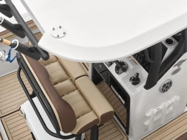 Slide: The Image of 2024 Yamaha Boats 255 FSH Sport H interior with seating and control panel. - 32