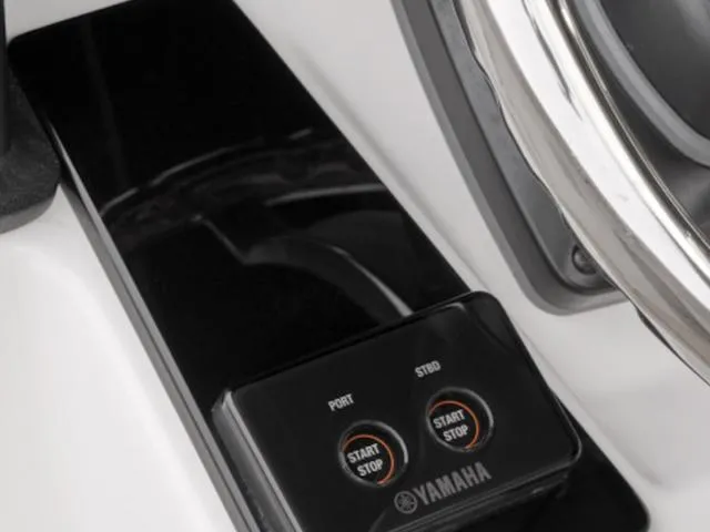 Slide: The Image of 2024 Yamaha Boats 255 FSH Sport H start-stop controls, featuring dual port and starboard buttons. - 36