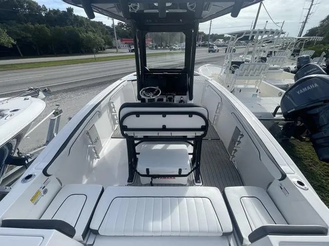 Slide: The Image of Close-up of 2024 Yamaha Boats 252SD cup holder and stainless steel fixture. - 5