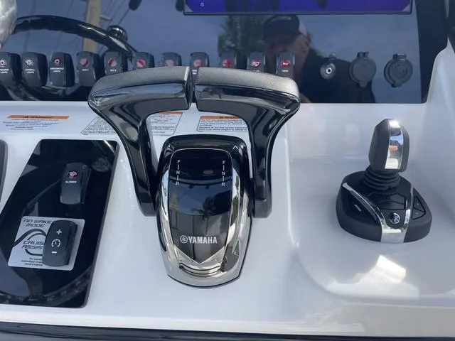 Slide: The Image of 2024 Yamaha Boats 252SD interior with tan leather seating and modern design. - 8