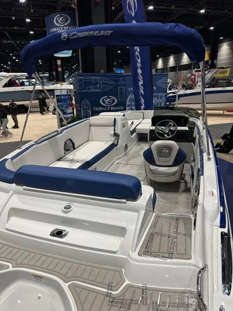 Slide: The Image of 2024 Crownline E230 XS boat interior at a boat show. - 3