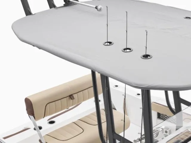 Slide: The Image of 2024 Yamaha Boats 222 FSH Sport with fishing rod holders and cushioned seating. - 44