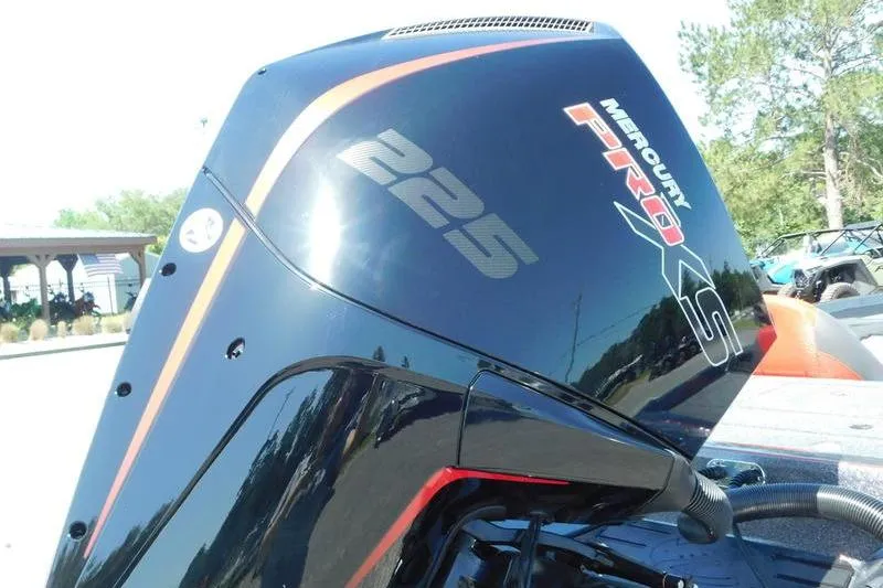 Slide: The Image of 2024 Ranger Z519 with Mercury Pro XS 225 engine, outdoor setting. - 11