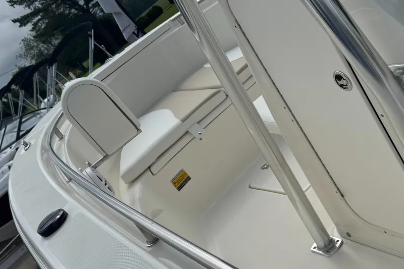 Slide: The Image of 2026 Bulls Bay 230 CC boat console with steering wheel and controls. - 10