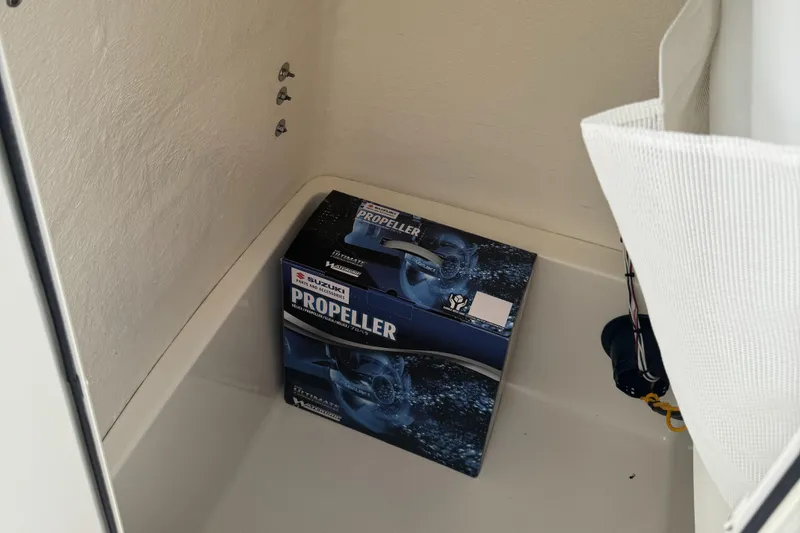 Slide: The Image of 2026 Bulls Bay 230 CC boat console with Garmin navigation system and steering wheel. - 9