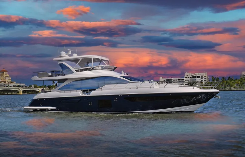 Slide: The Image of 2022 Azimut 72 FLY yacht cruising at sunset with vibrant sky. - 0