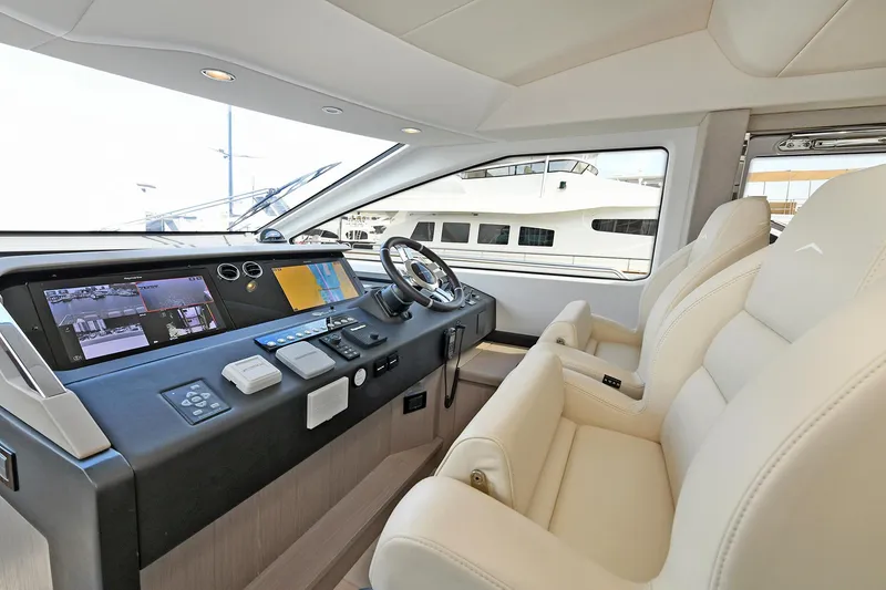 Slide: The Image of Interior of 2022 Azimut 72 FLY yacht with modern helm and luxurious seating. - 1