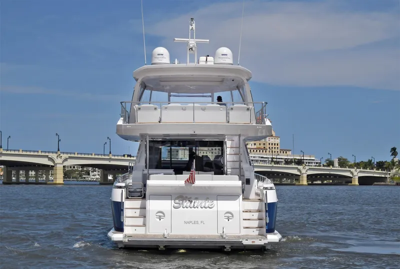 Slide: The Image of 2022 Azimut 72 FLY yacht on water near a bridge. - 14