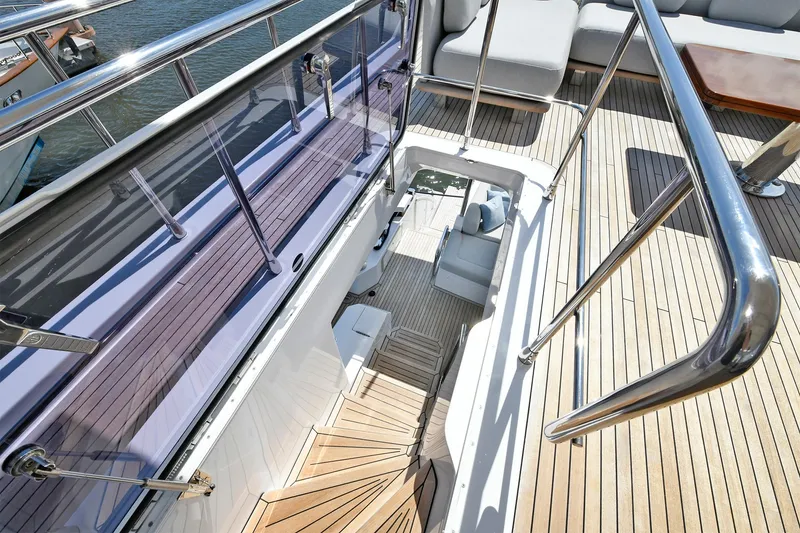 Slide: The Image of 2022 Azimut 72 FLY yacht staircase and deck with modern design. - 34