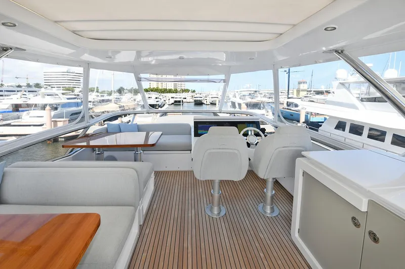 Slide: The Image of Interior of 2022 Azimut 72 FLY yacht with modern seating and helm station. - 45