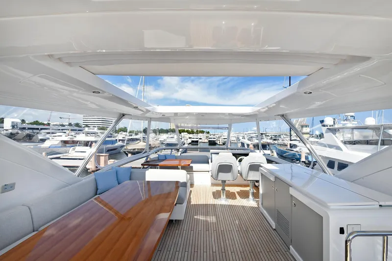 Slide: The Image of Luxurious 2022 Azimut 72 FLY yacht interior with spacious seating and modern amenities. - 49