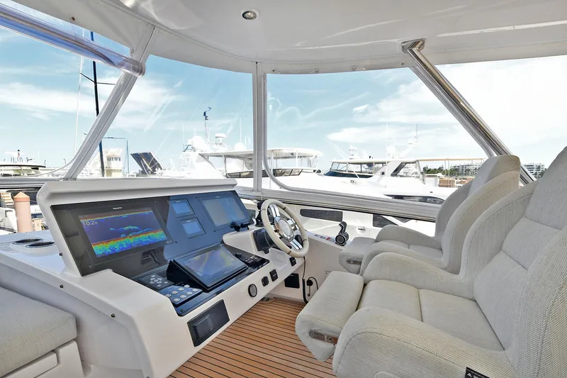 Slide: The Image of Cockpit view of 2022 Azimut 72 FLY yacht with modern navigation systems. - 50