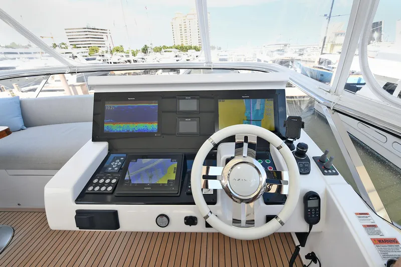 Slide: The Image of 2022 Azimut 72 FLY yacht helm station with advanced navigation systems. - 52