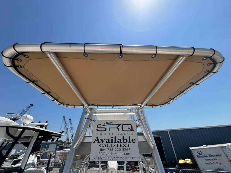 Slide: The Image of 2009 Andros Tarpon 26 boat with canopy, available at SRQ Yacht Sales. - 4