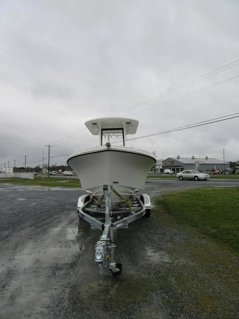 Slide: The Image of 2024 Parker 2200 Center Console boat on trailer in parking lot. - 7