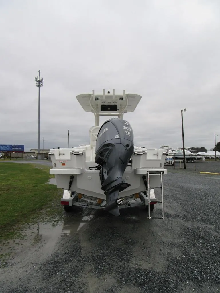Slide: The Image of 2024 Parker 2200 Center Console boat with outboard motor, rear view. - 8