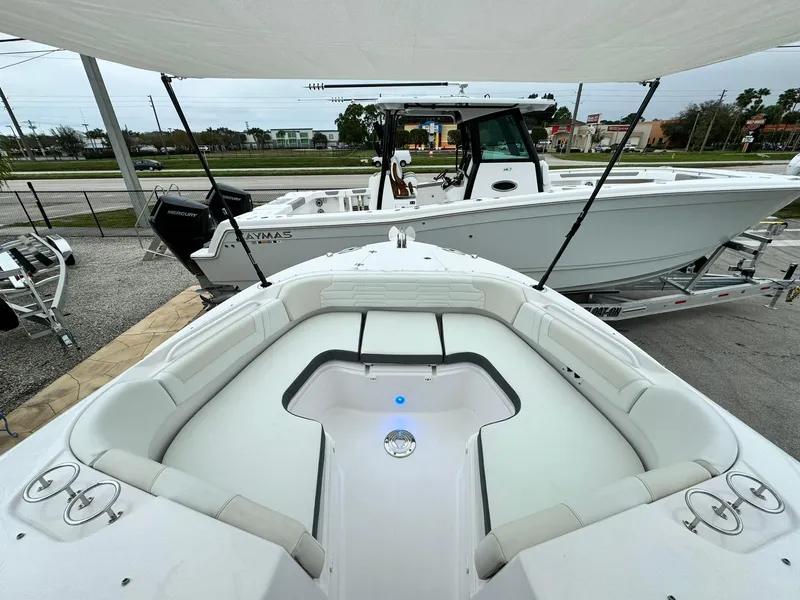 Slide: The Image of 2024 Edgewater 280cx boat with spacious seating and modern design. - 29
