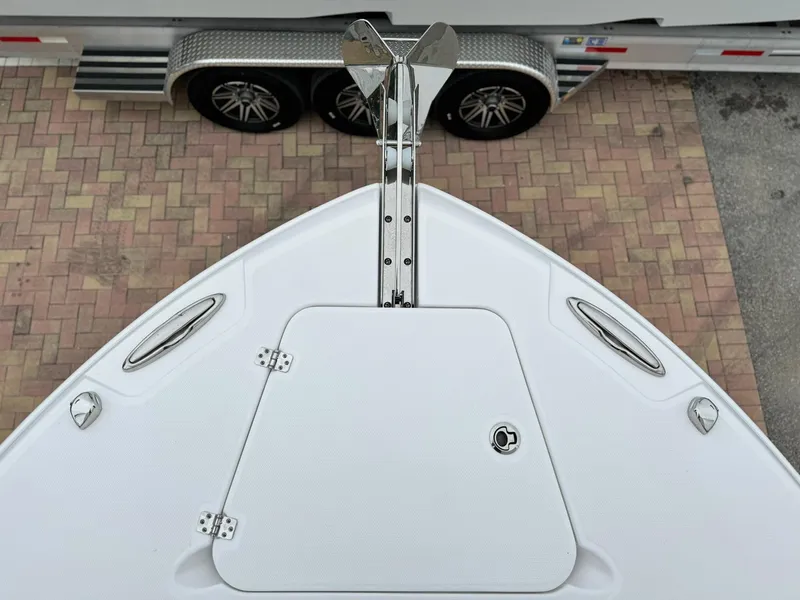 Slide: The Image of Top view of 2024 Edgewater 280cx boat bow with anchor and hatch. - 30