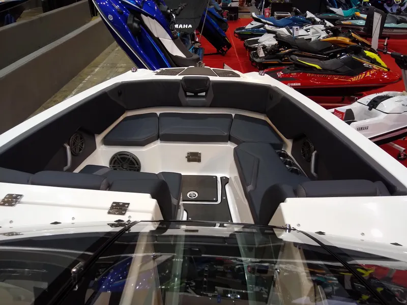 Slide: The Image of 2024 Scarab 285 Wake ID boat interior with seating and speakers. - 7
