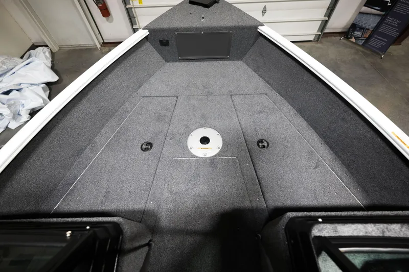 Slide: The Image of 2024 Lund 1675 Adventure Sport boat interior, spacious deck. - 10