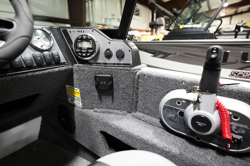 Slide: The Image of 2024 Lund 1675 Adventure Sport boat dashboard and control panel. - 20