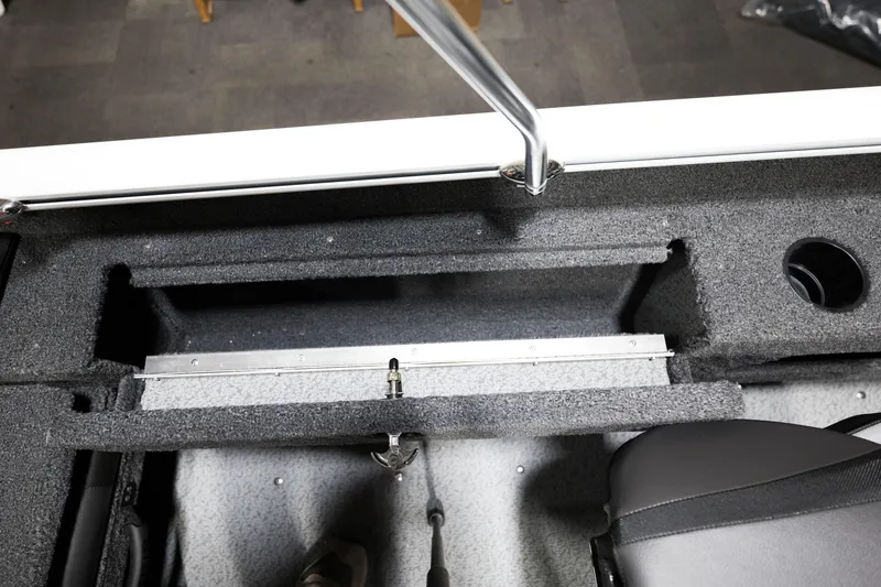 Slide: The Image of 2024 Lund 1675 Adventure Sport boat interior storage compartment. - 23