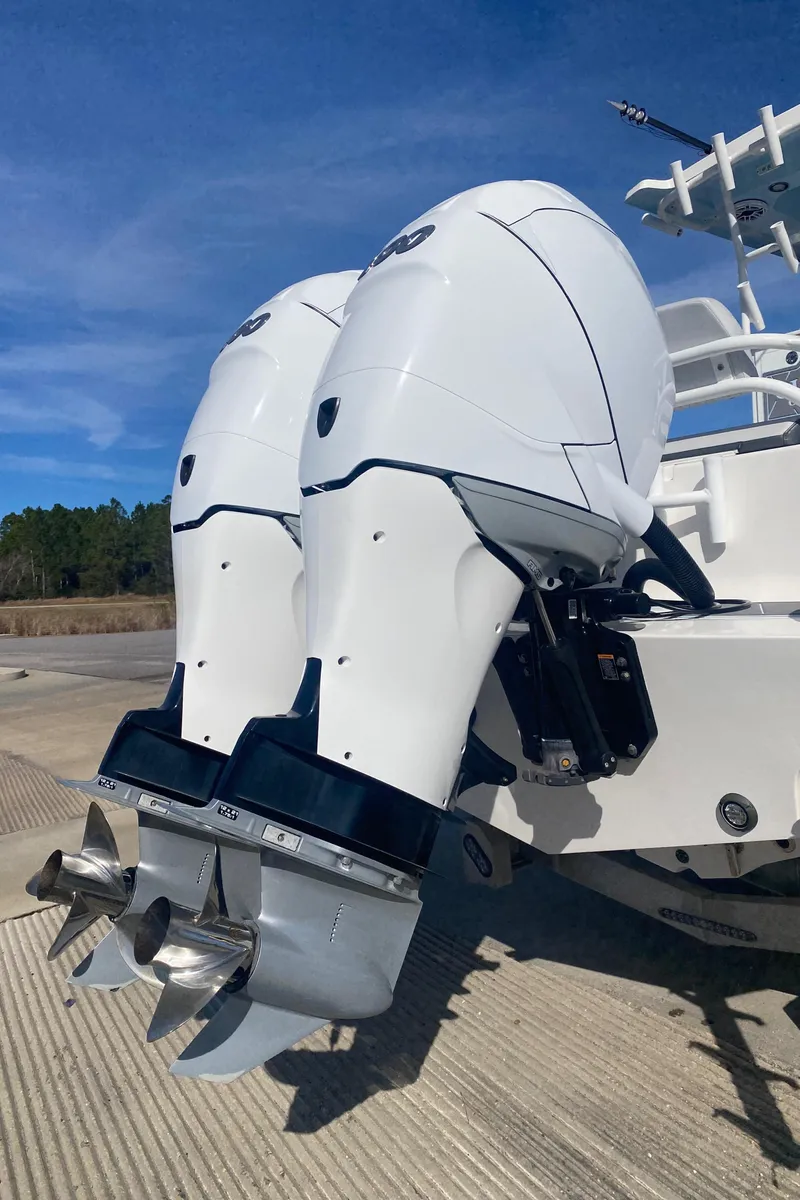 Slide: The Image of 2022 Fountain 34 Tournament Edition boat with dual outboard motors. - 15
