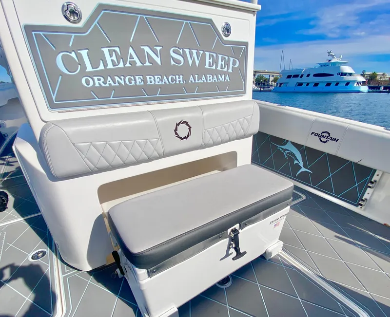 Slide: The Image of 2022 Fountain 34 Tournament Edition boat with Clean Sweep signage, docked in Orange Beach, Alabama. - 26