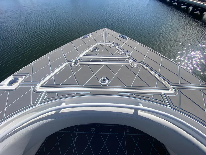 Slide: The Image of 2022 Fountain 34 Tournament Edition boat bow on water. - 36