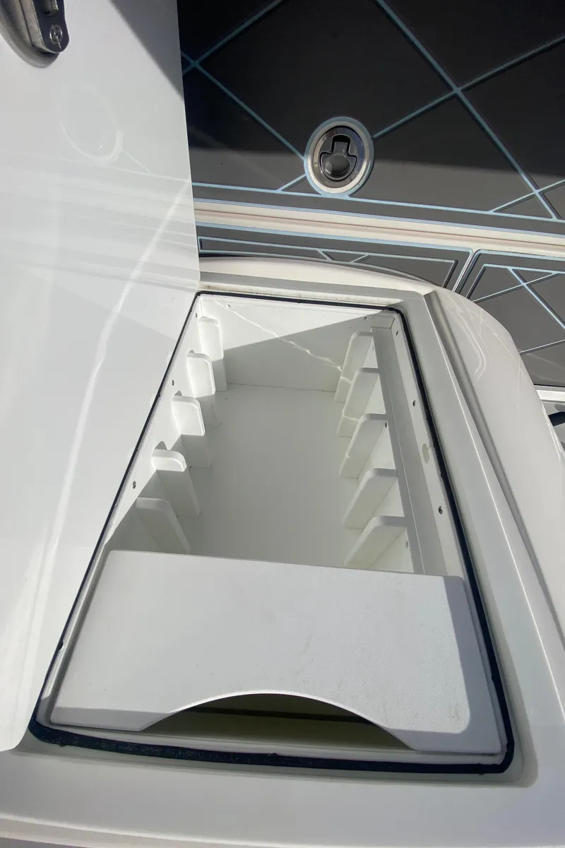 Slide: The Image of 2022 Fountain 34 Tournament Edition boat storage compartment. - 40