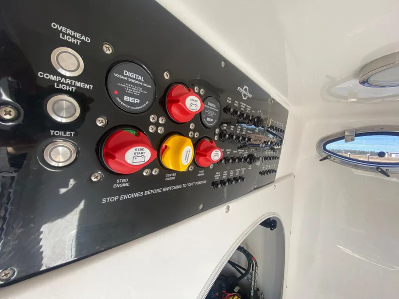 Slide: The Image of Control panel of a 2022 Fountain 34 Tournament Edition boat. - 45