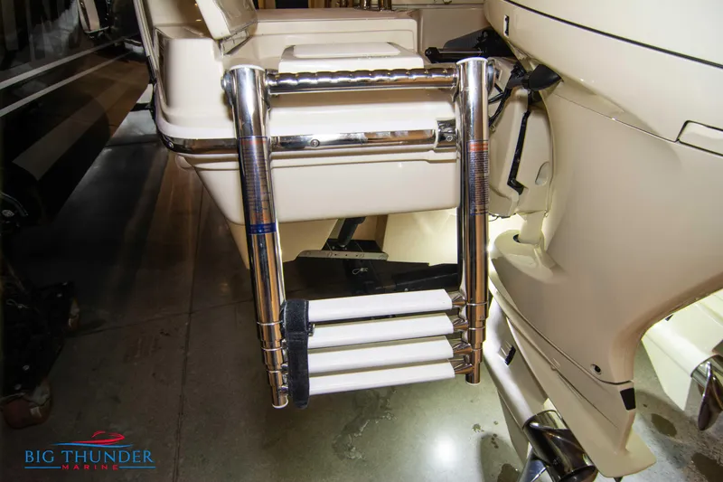 Slide: The Image of 2024 Capoforte FX270 boat ladder and engine detail at Big Thunder Marine. - 16