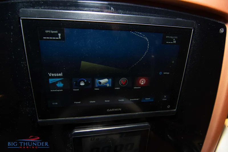 Slide: The Image of 2024 Capoforte FX270 vessel control panel with Garmin display. - 36