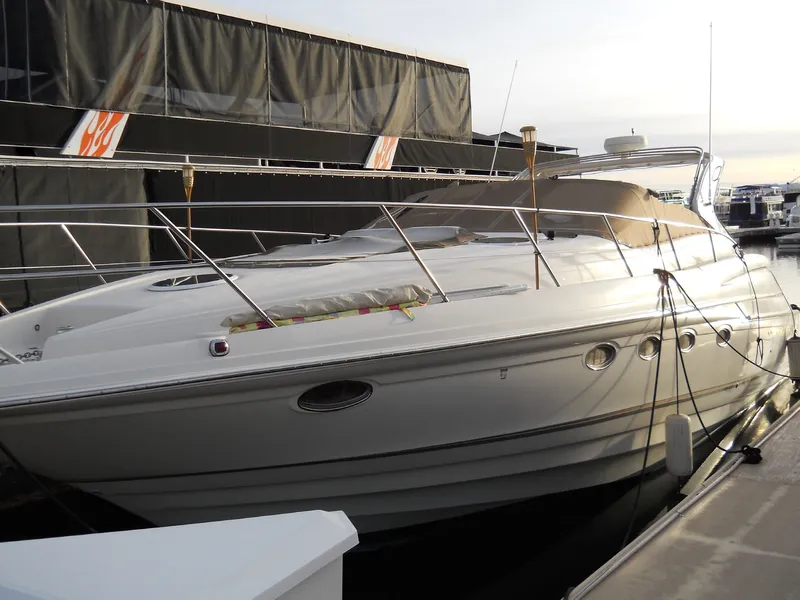 Slide: The Image of 2001 Regal 4160 Commodore yacht docked at marina. - 21