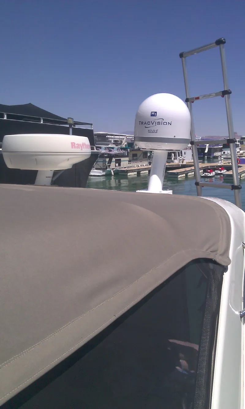 Slide: The Image of 2001 Regal 4160 Commodore yacht with radar and satellite equipment. - 22