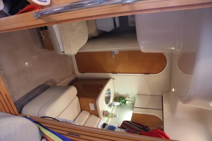 Slide: The Image of Interior cabin of a 2001 Regal 4160 Commodore yacht with seating and sink. - 30